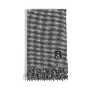 Straight image of the black and white dogtooth lambswool scarf.