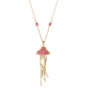 Front view of gold-plated jellyfish necklace with pink resin pendant and dangling tentacles.