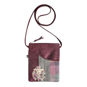 Earth Squared Tweed Applique Sling Bag: Classic Plum Tweed with Matching Cord Detail. Secure Zip Closure & Cute Sheep Applique on Front. Long Strap for Easy Carrying.