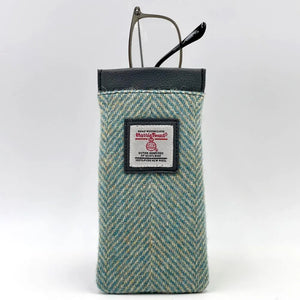 Harris Tweed Glasses Sleeve in Turquoise. Soft lining protects eyewear from scratches and dust. Secure snap closure keeps glasses safe.