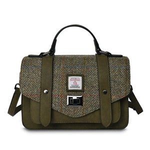 Islander Chestnut Herringbone Harris Tweed Satchel with a green PU leather body and shoulder strap behind.
