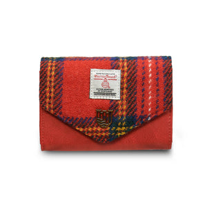 Front view of Islander Royal Stewart Harris Tweed purse with red tartan flap and Harris Tweed label.