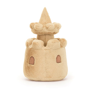 Back View: Beach day fun awaits! The Jellycat Amuseable Sandcastle, a cuddly companion for building memories at the shore or at home.