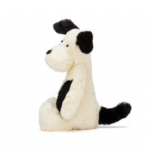 Jellycat Black & White Bashful Puppy from the side.