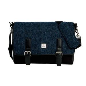 Navy Blue Herringbone Harris Tweed Messenger Bag for both men and women with the shoulder strap dropped across the top.