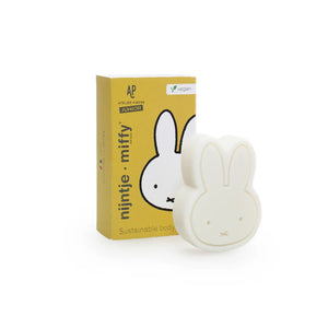 Front view of Miffy-shaped vegan soap with yellow box featuring red berry scent and sustainable body care branding.