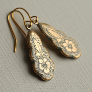 Gold and blue enamel Victorian drop earrings with floral pansy and feather engraving on curved brass base.