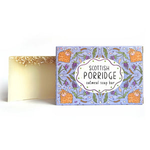Scottish Porridge oatmeal soap bar with illustrated packaging featuring Highland cows and thistles, natural exfoliating oat soap made in the UK.