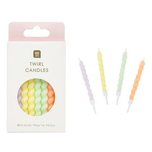 Box of Twisted Pastel Birthday Candles by Talking Tables in pastel yellow, pink, green and purple shades.