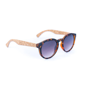 Front view of round tortoiseshell sunglasses with cork arms.