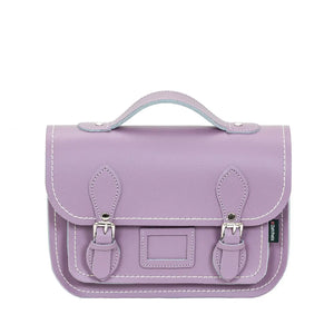 Leather satchel in a pastel violet colour. It has a top handle and closes with buckles. 