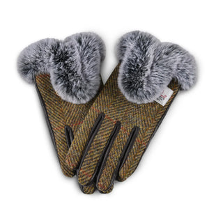 Ladies gloves in a brown and green Chestnut Herringbone Harris Tweed and with a faux fur trim.