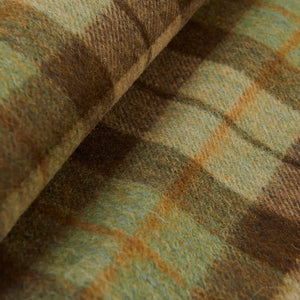 Close up of the chestnut tartan pattern of the scarf.