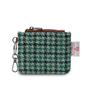 Green Dogtooth Harris Tweed Card Wallet with a keychain attachment.