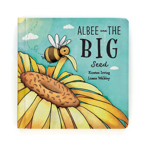 Jellycat childrens book about a bee and a big seed. It is brightly coloured and  and has a picture of a bee on a sunflower on the front. 
