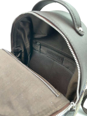 Inside of the Maccessori harris tweed backpack showing an inside pocket.