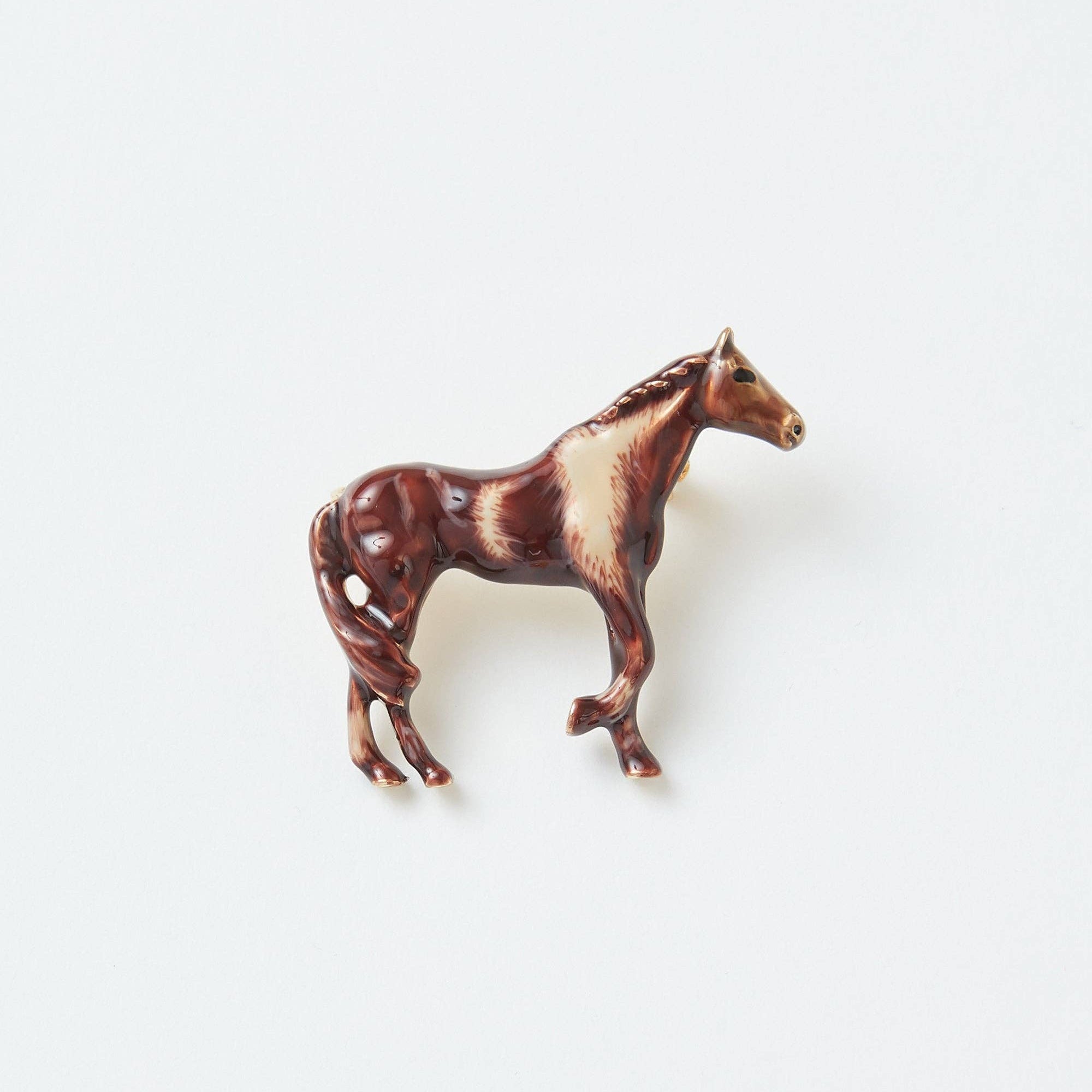 Enamel Farm Horse Brooch side view showing hand-painted chestnut horse with white markings