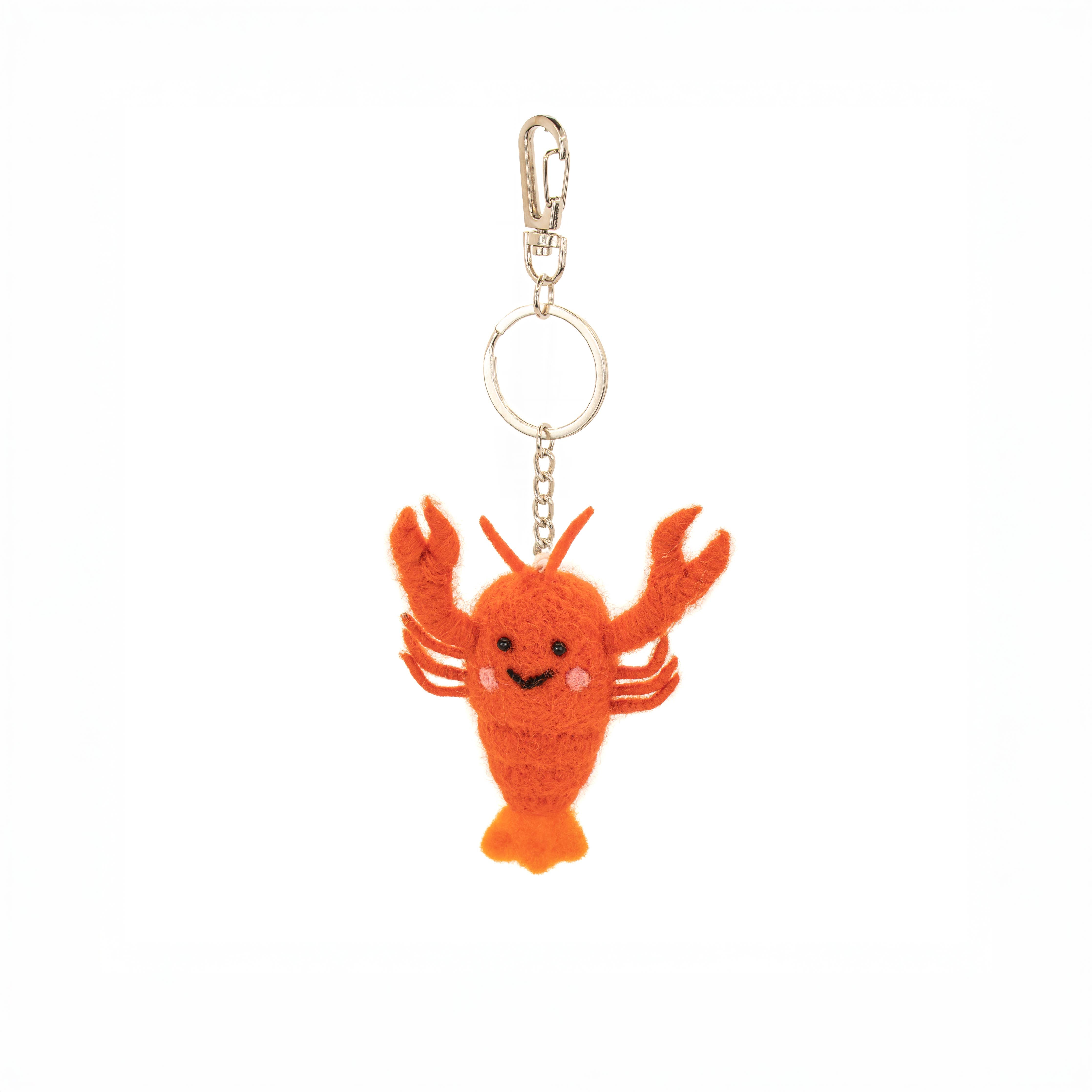 Close-up of red wool felt lobster keyring showing crafted details