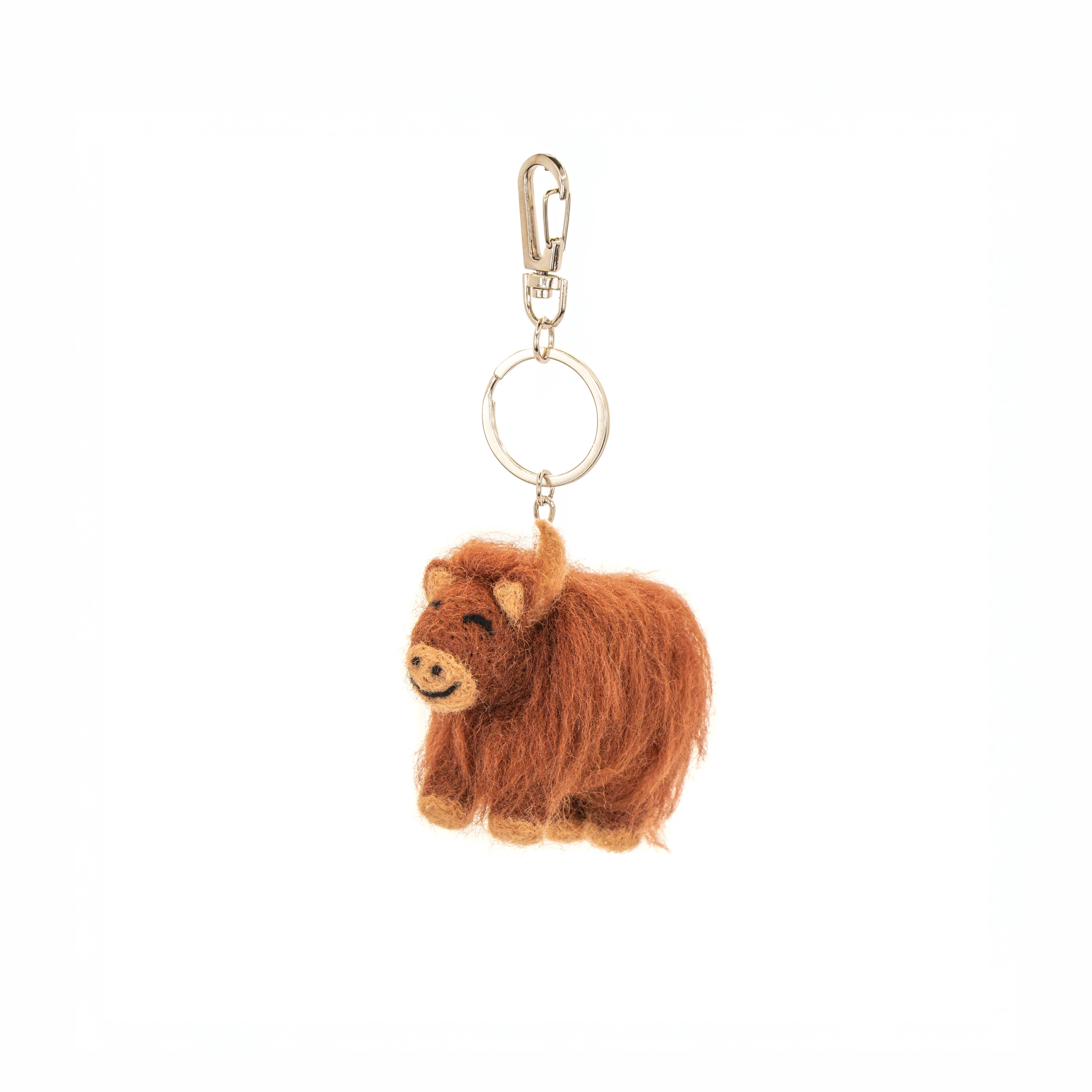 Highland cow keyring showing detailed stitching and soft felt construction