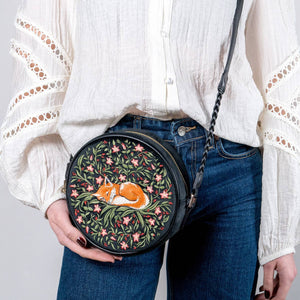 Sleepy Fox Circle Crossbody Bag front view showing embroidered sleeping fox surrounded by colourful flowers