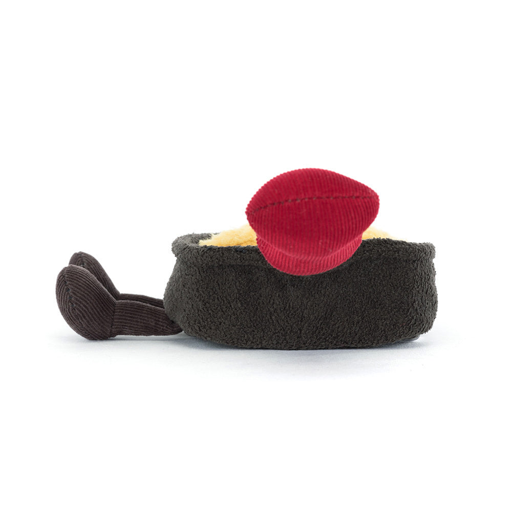 Back view of Jellycat Amuseables Raclette plush with red handle.