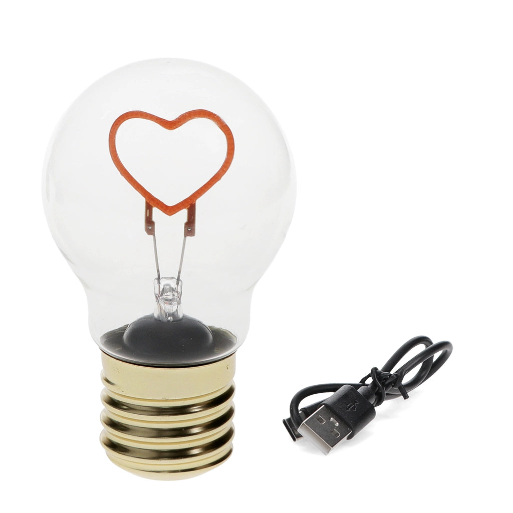USB rechargeable heart light bulb lamp with pink heart LED and included USB-C charging cable.