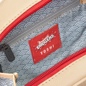 Inside pocket close-up – Interior of Jammie Dodger Biscuit Leather Cross Body Bag with zip pocket and official Yoshi lining.