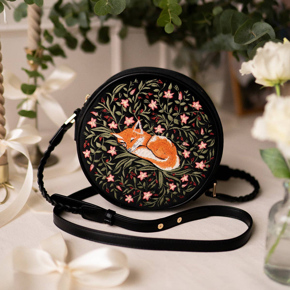 Sleepy Fox Circle Crossbody Bag angled view displaying circular shape and piped edging