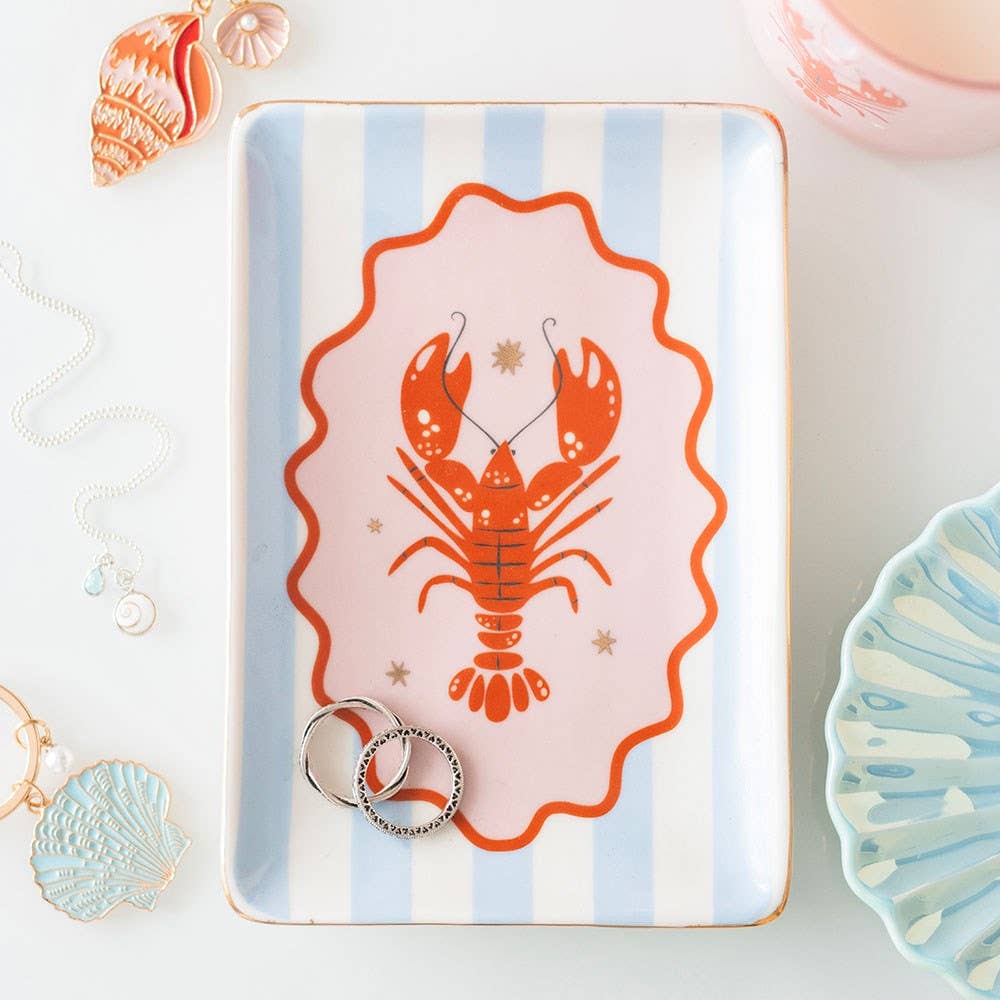 Pastel blue striped ceramic trinket dish with red lobster design