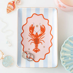 Pastel blue striped ceramic trinket dish with red lobster design