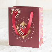 Sacred heart Valentine gift bag with bold red heart design