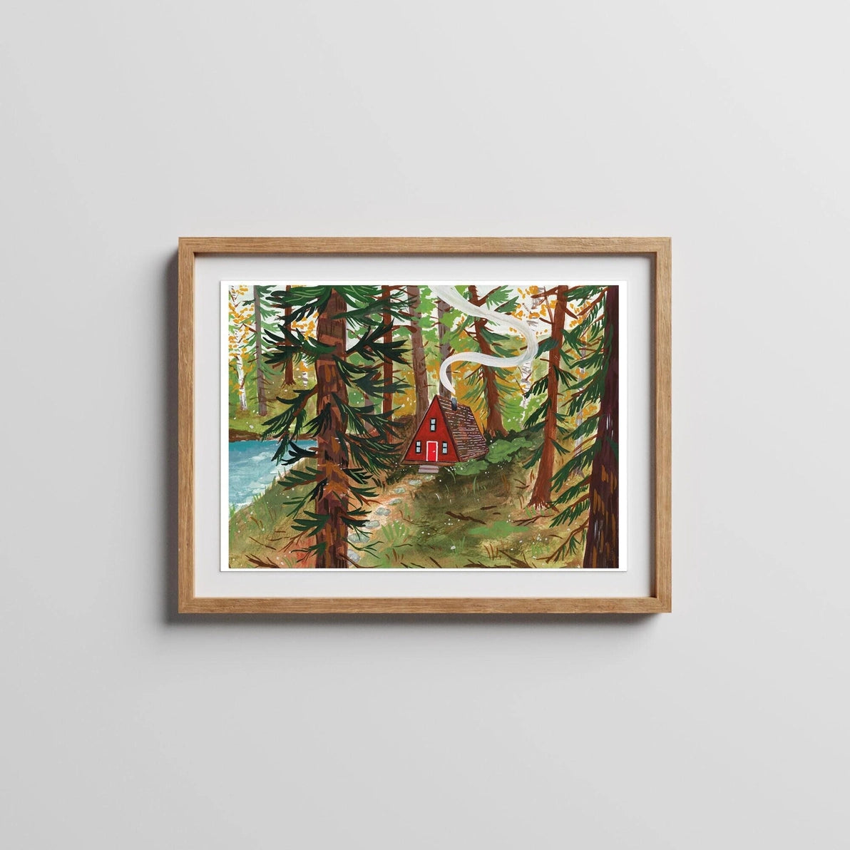 A-Frame Cabin Art Print in wooden frame on wall – giclée autumn landscape artwork.