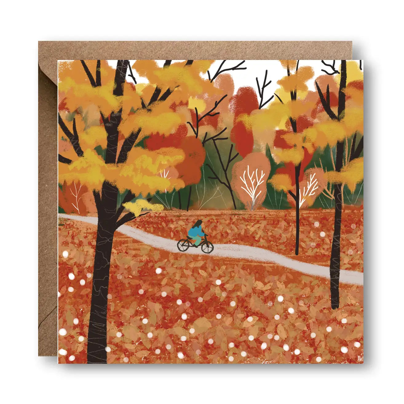 Autumn Cycling Card by Charis Raine featuring a cyclist riding through a forest of golden autumn leaves, printed on a 15x15cm luxury card with Kraft envelope.