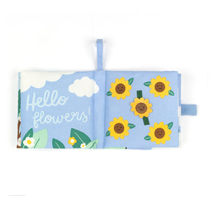 Sensory play on the go! The Jellycat Hello Sun Fabric Book features crinkle pages, applique textures, a mirror, and a slim profile for easy carrying.