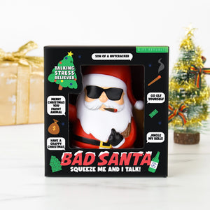 Front view of Bad Santa stress toy in gift box, with festive phrases and bold packaging.