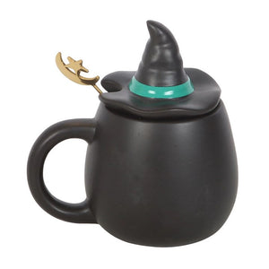 Back view of Bad Witch mug showing witch hat lid and gold spoon.