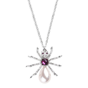 Front view of Bill Skinner Pearl Spider Necklace featuring a silver-tone spider pendant with amethyst gemstone centre, clear crystal legs, and a teardrop-shaped faux pearl body, suspended on a rhodium-plated chain.