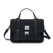 Black Herringbone Medium Satchel with Harris Tweed® shown from the front with top handle and detachable shoulder strap.