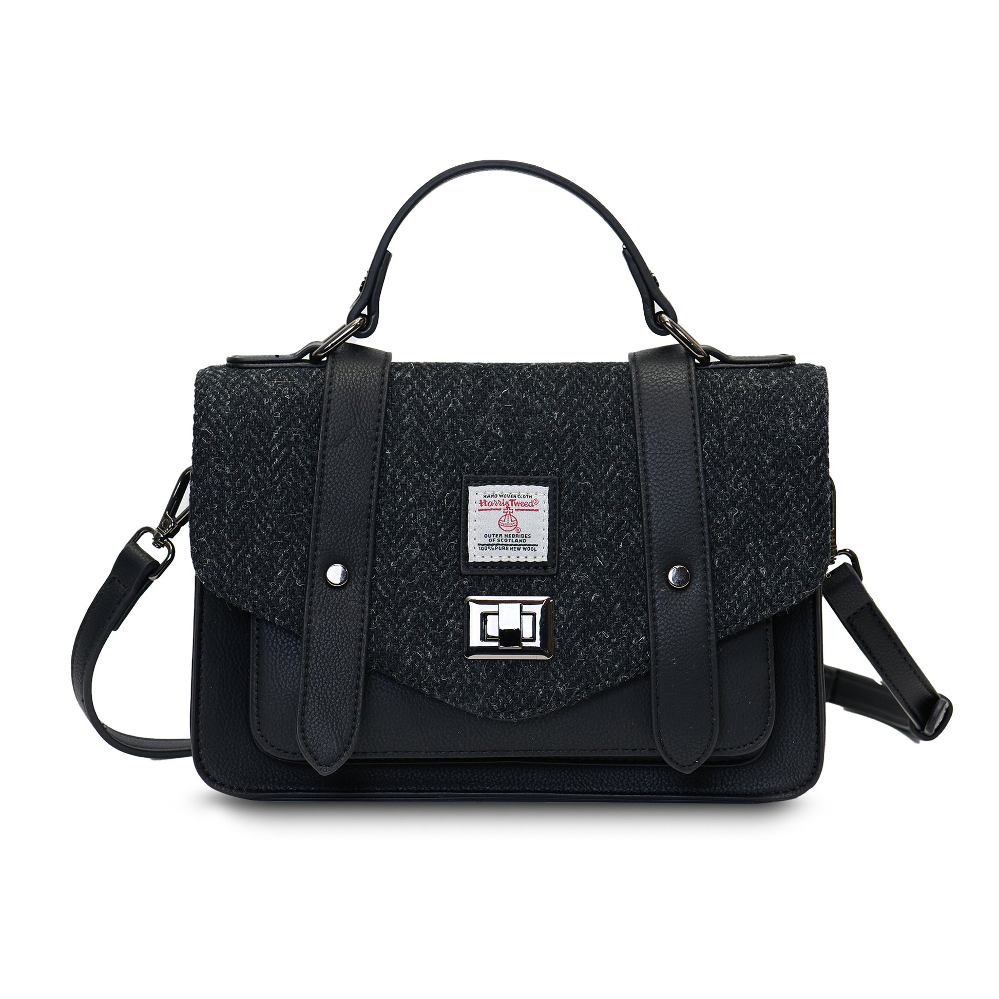 Black Herringbone Medium Satchel with Harris Tweed® shown from the front with top handle and detachable shoulder strap.