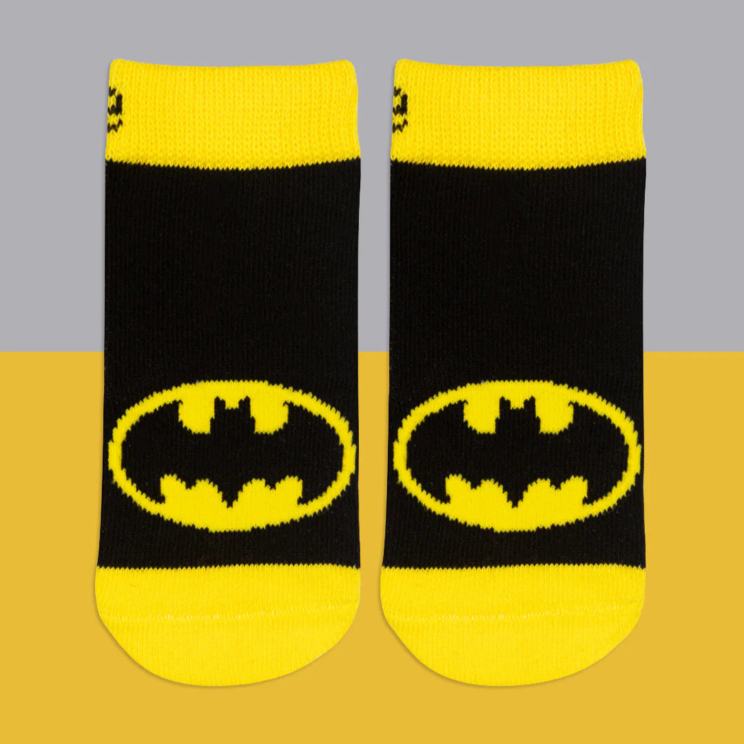 Pair of Blade & Rose Batman Get Ready Socks in black with yellow cuffs, toes, and heels, featuring bold yellow Batman logo on the front.