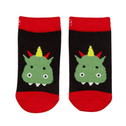 Blade & Rose Teddy the Dragon baby socks with green dragon face, red cuffs and toes on a black background, laid flat side by side.