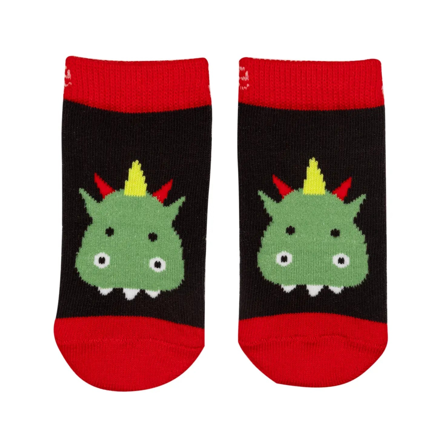 Blade & Rose Teddy the Dragon baby socks with green dragon face, red cuffs and toes on a black background, laid flat side by side.