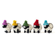 Group of five knitted sheep keyrings wearing colourful bobble hats.