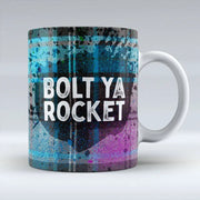 Bolt Ya Rocket Scottish tartan ceramic mug with bold text.