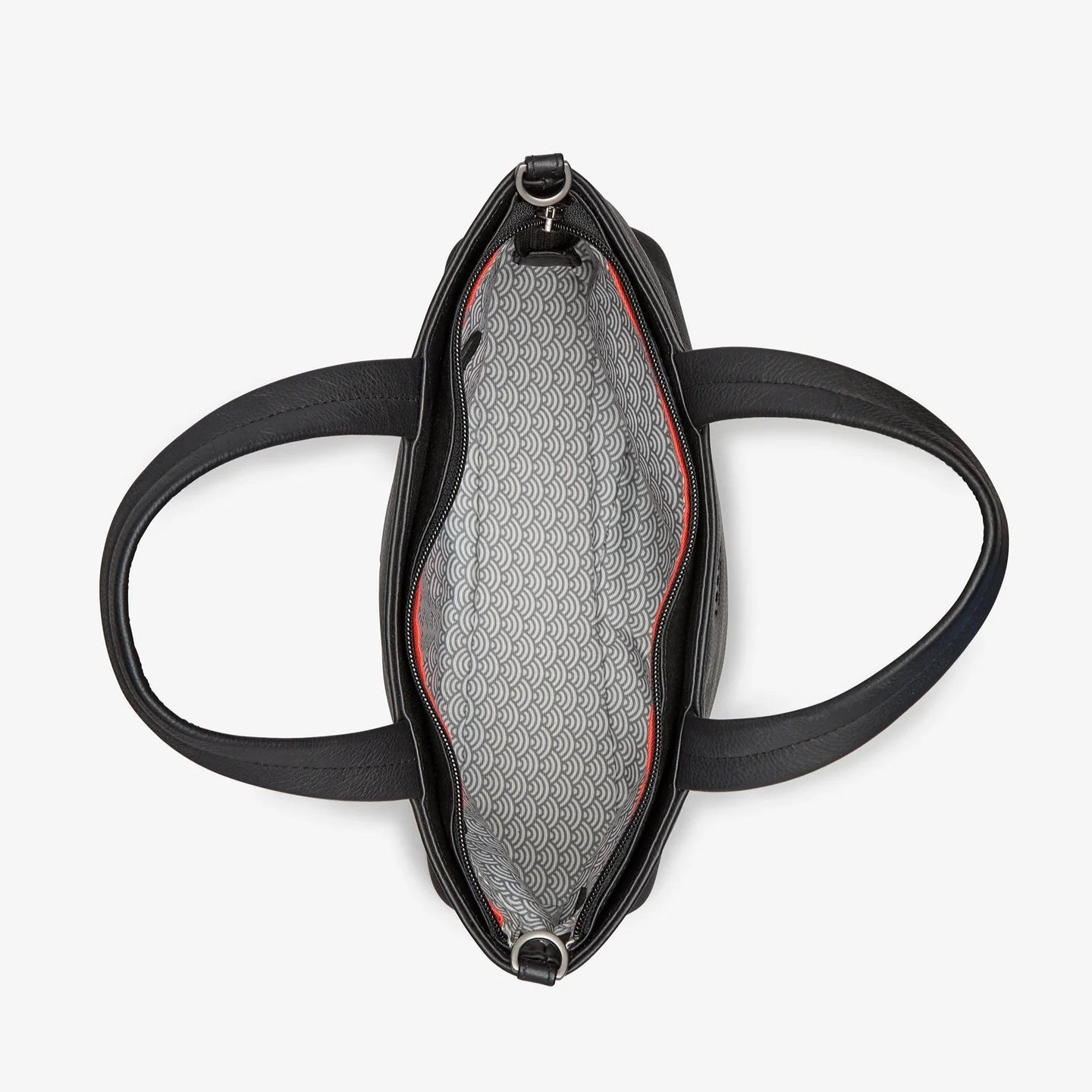 Interior of Bookworm Black Leather Multiway Grab Bag showing patterned lining and compartments.