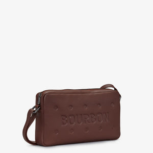 Side angled view of Bourbon Biscuit Leather Cross Body Handbag with embossed biscuit design.