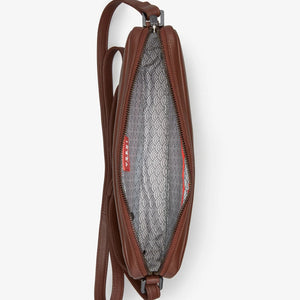 Interior view of Bourbon Biscuit Leather Cross Body Bag showing patterned cotton lining and roomy compartments.