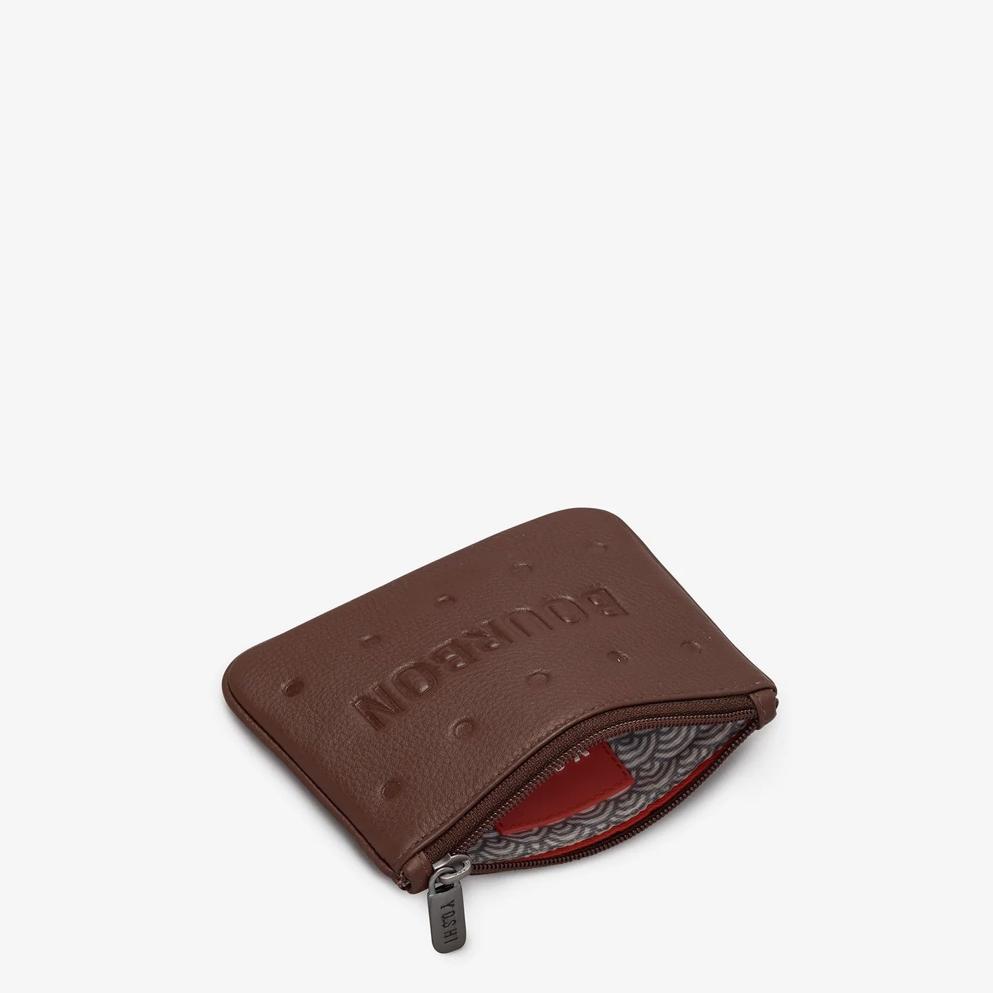 Inside of Bourbon Biscuit leather zip purse with patterned cotton lining and card storage space.