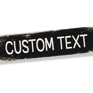 A blank metal sign ready for custom text, featuring a rustic, distressed black and white design, ideal for personalised messages.