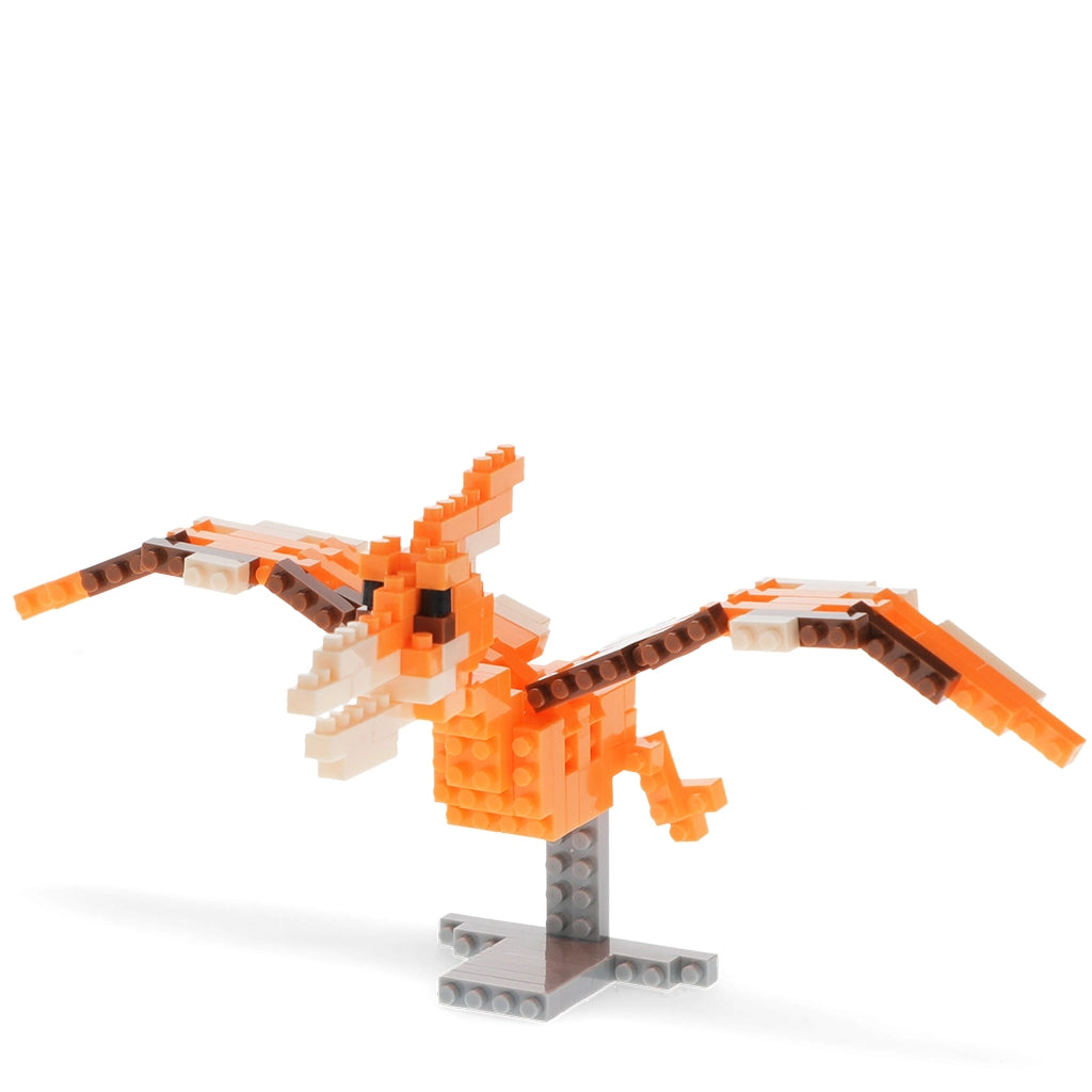 Close-up of completed orange and brown Pterodactyl micro brick dinosaur model.